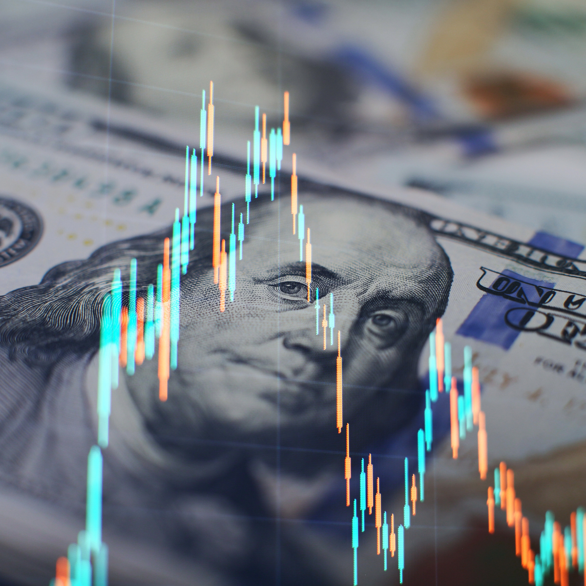 Image of money overlayed with an image of market trends.
